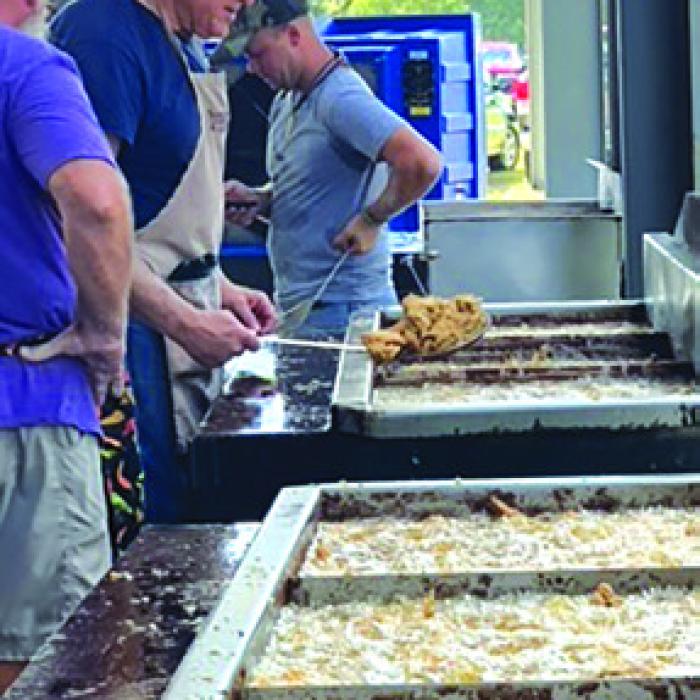 Frying chicken at the St. Mary’s Bazaar.