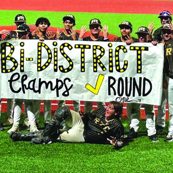 The members of the Round Top-Carmine baseball team celebrate after Thursday’s playoff sweep of Hull-Daisetta.