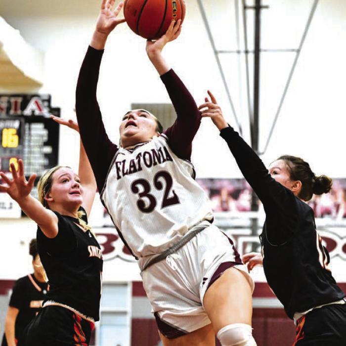 Flatonia’s Katelin Sullivan shoots for two in the final minute of the Flatonia and Smithville championship game Saturday. The Lady Bulldogs have two tournament championships on the season. Photos by Stephanie Steinhauser