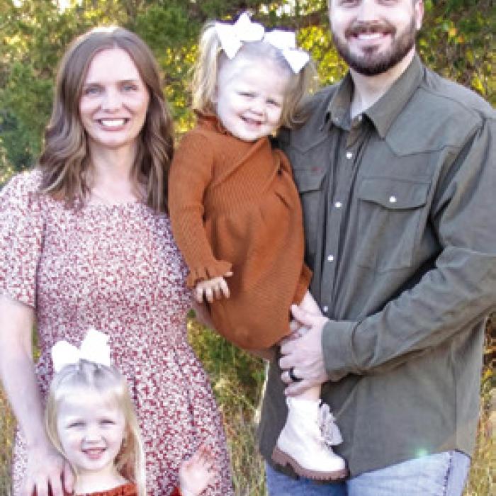 Fayetteville’s Brandy and Mike Belota with daughters Scarlett and Summer.