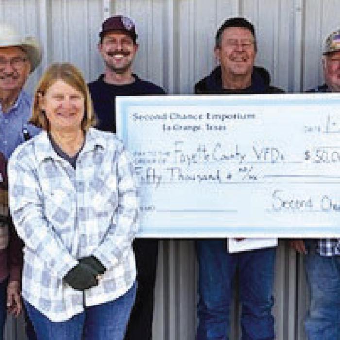Second Chance Makes Donation to Local Fire Departments