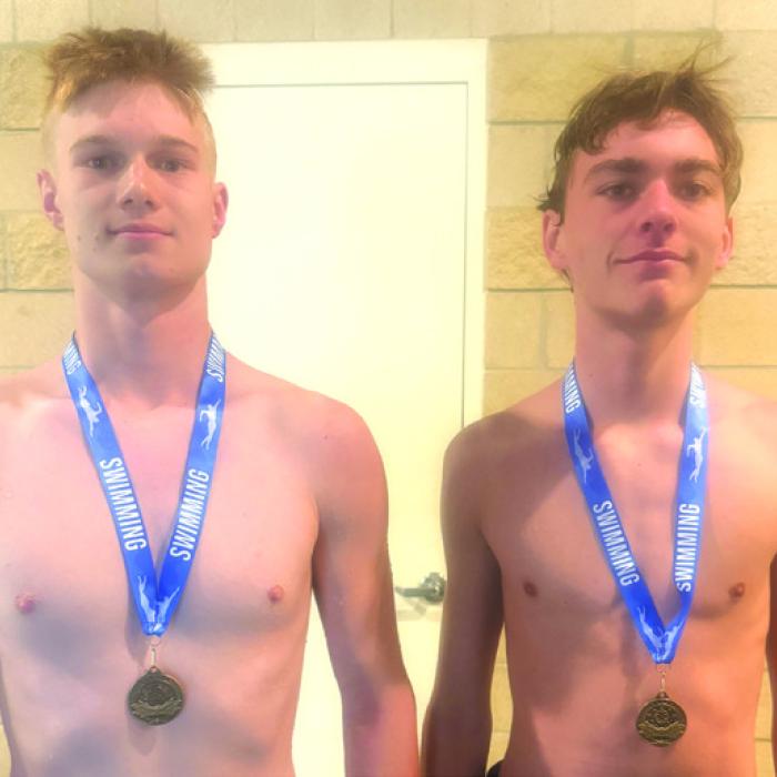 Swimmers of the Meet honors went to freshman Van Huette, right, and junior Haygan Mings, left, both of whom delivered major time drops.