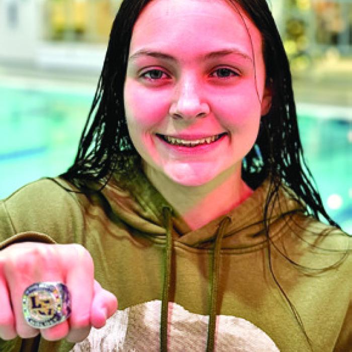 Sophomore Adysen Janacek made history Monday night, becoming the first female swimmer in program history to have her name attached to eight school records.