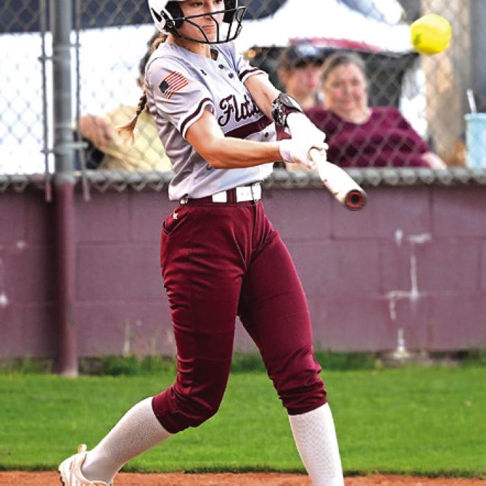 Lead off batter Sadie Noska gets the Flatonia Lady Bulldogs offense started Tuesday night in their big win over Bloomington. Photo by Stephanie Steinhauser