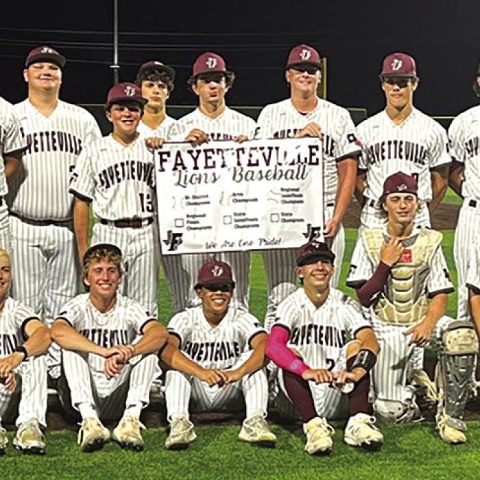 The Fayetteville baseball team poses on the field after Thursday’s playoff sweep of Knippa.
