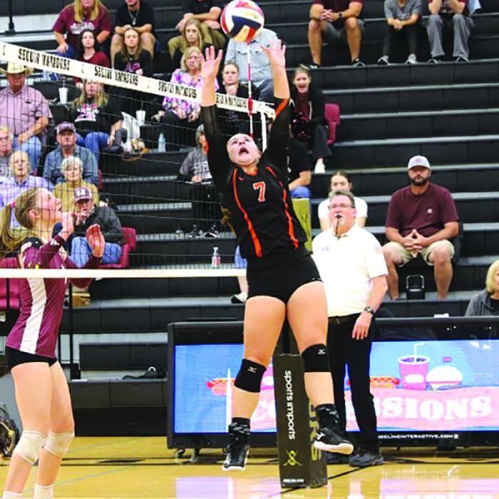 Schulenburg’s Landry Zapalac sets a ball in Thursday’s victory over Johnson City. Photo by Audrey Kristynik