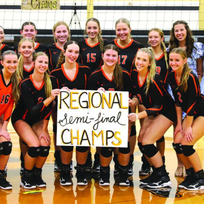The members of the Schulenburg volleyball team celebrate their regional semifinal victory over Johnson City Thursday in Seguin. Photo by Audrey Kristynik