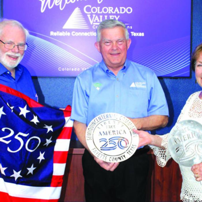 To celebrate America’s 250th birthday, 250 “Liberty Trees” will be planted this fall all across the county. Colorado Valley Communications is the first Gold Sponsor for the project. Larry Jackson, project chair, and Karen Mahoney-Woods, project secretary, present CVCTX president and general manager Kelly Allison with a Liberty Tree commemorative medallion.