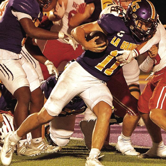 La Grange quarterback Eli Gillum runs for a touchdown two weeks ago against Bellville. Photo by Darrell D. Gest
