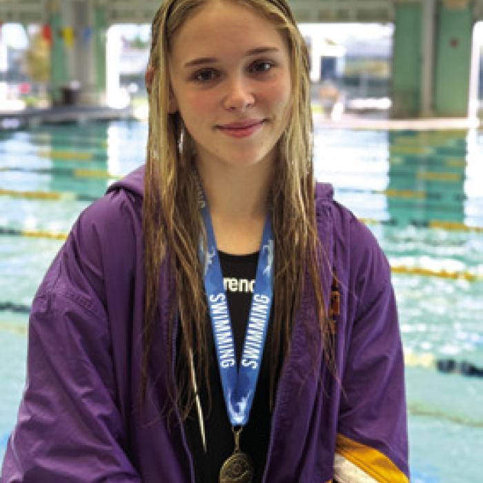 Freshman Lyria Hartley earned Swimmer of the Meet honors after cutting a remarkable 2.40 seconds from her 100-yard freestyle.