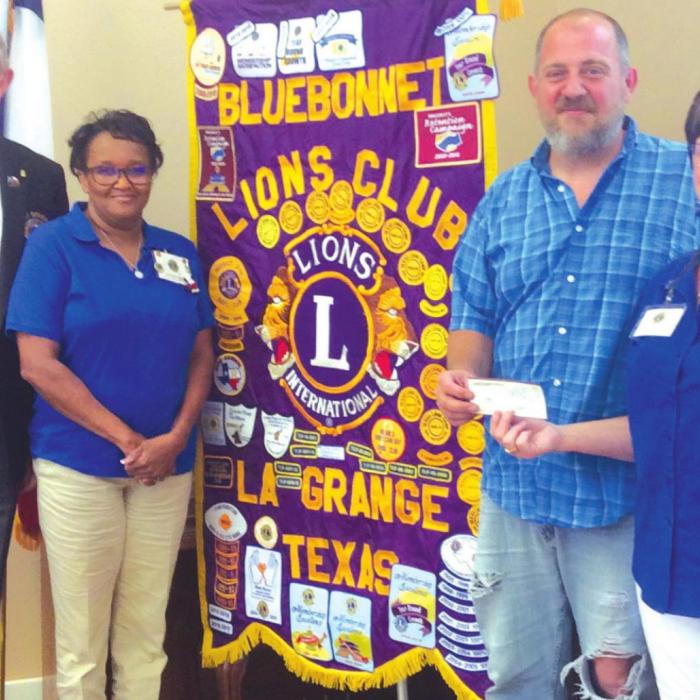 Lions Donate to Habitat for Humanity