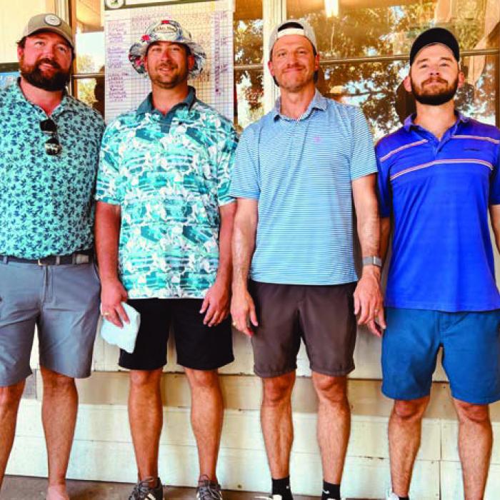 1st Place 2nd Flight - Sean McCourt, Ryan Havrda, Geoffrey Schiffli, and Jordan Schiffli - 7 under par.