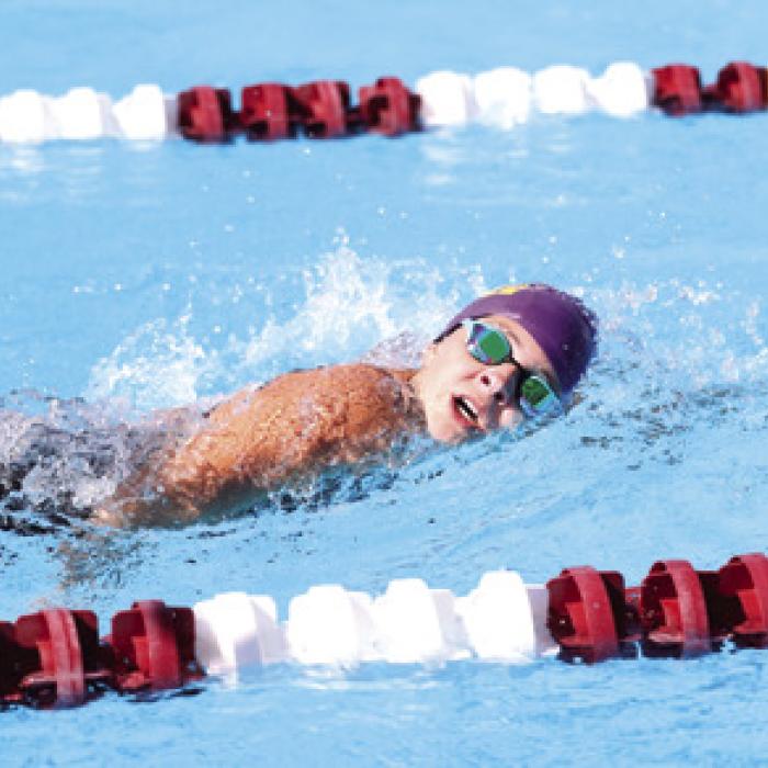 Freshman Adysen Janacek continued her record-breaking streak, clocking a remarkable 2:20.49 in the 200 Freestyle, slicing two seconds off her previous best. Photo by Katy Michalke