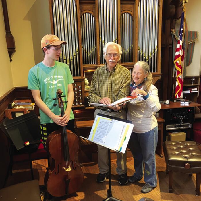 St. James Music Directors Don and Mary Kirby and cellist Luke Huser discussing the church’s June 26 and 27 event for the 250th celebration of the America’s Founding.