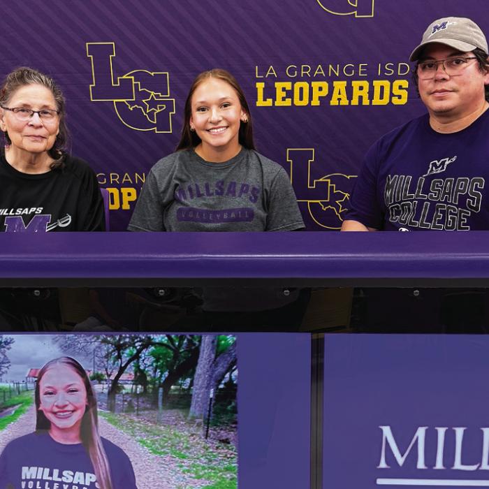 La Grange senior Kyla Colon, center, inked a deal to play volleyball for Millsaps College in Jackson, Mississippi.