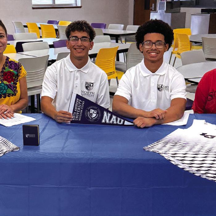 La Grange seniors Abbot Acosta, second from left, and Tacoby East, third from left, inked deals to run track for North American University in Stafford.