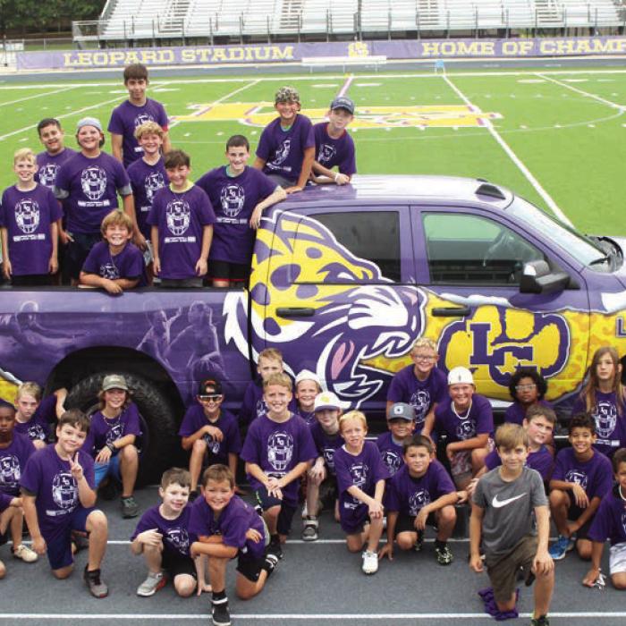 Leps Hold Football Camps; Get Magazine Preview