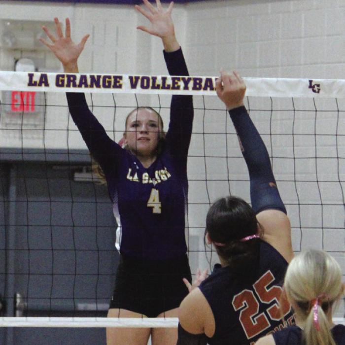 La Grange’s Avery Griffin jumps to block a ball in a win last week over Caldwell.