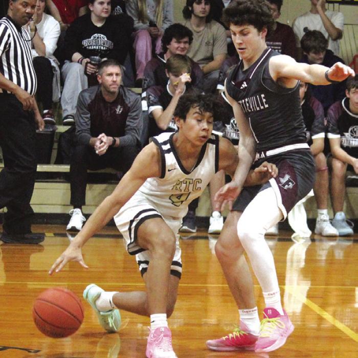 Fayetteville’s Mason Fenhaus, right, plays some tough defense against Round Top-Carmine’s Facundo Cerda Friday. Photo by Jeff Wick
