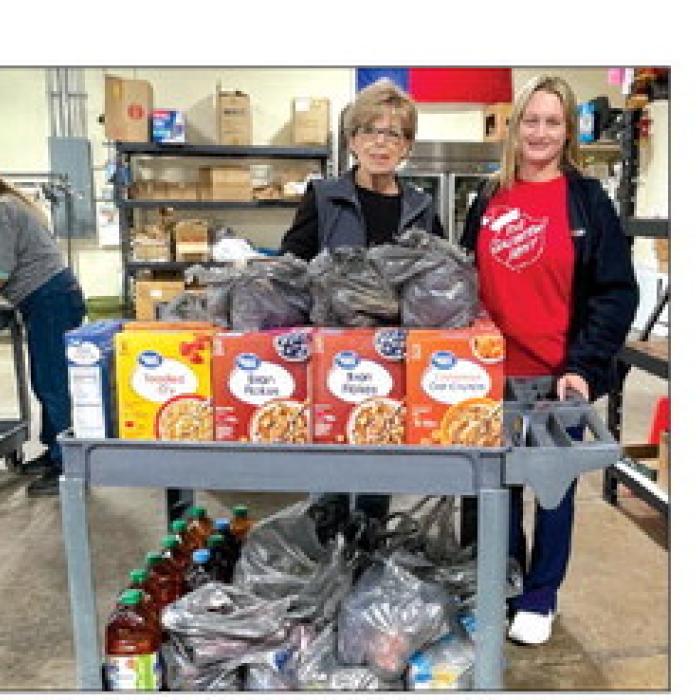Sally Garrett and Krystal Segar dropped off donations to AMEN.