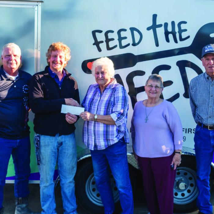 St. John Lutheran Church of Ellinger made a donation to Feed the Need Missions last week. Members of the Church Council presented the donation to Dr. Jeremy Finch of Feed the Need. Pictured are (from left) Scott Lucky of St. John Lutheran Church, Dr. Jeremy Finch, and Lucille Koehl, Annie Mueller and J.R. Koehl of St. John Lutheran Church. Staff photo by Andy Behlen