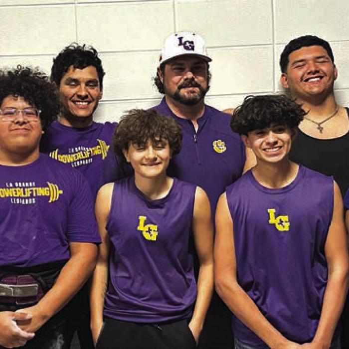 La Grange high School powerlifting team at regionals: (front, from left) Bryan Jimenez, Erick Guevara, Caden Chowdry, Frank Gonzalez, Elmer Saldierna, (back) Coach Nick Parker, Ramon Ortiz, Coach Charles Otto, Javier Cuevas, Coach Frankie Saucedo.
