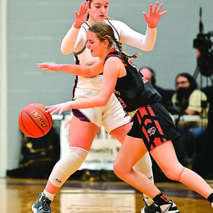 Flatonia’s Abbie Uzzell plays defense against Miranda Bonner of Schulenburg. Photo by Stephanie Steinhauser