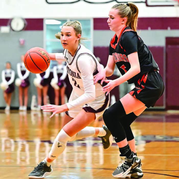 Summer Sodek drives the ball for Flatonia as Schulenburg’s Jenna Guentert plays defense. Photo by Stephanie Steinhauser