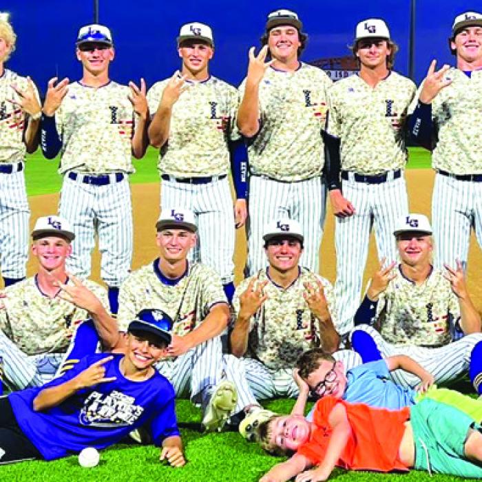 The members of the La Grange baseball team pose after Saturday’s doubleheader victory over Burnet.