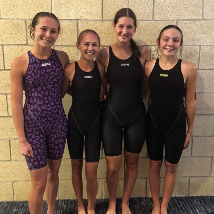 The La Grange girls’ 400 freestyle relay team of, left to right, Eleanor Carey, Lillian Carey, Elena Supak, and Adysen Janacek.