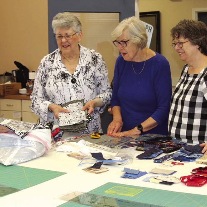Guild Works on Quilt of Valor Project