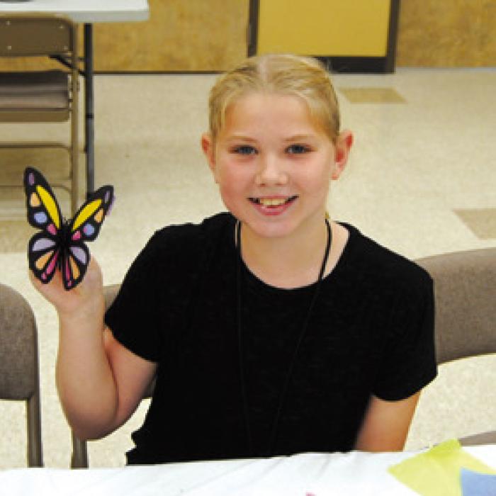 Brynlee Berger with butterfly craft.