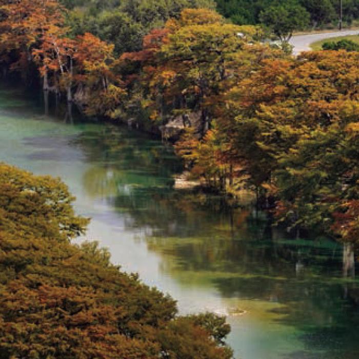 The trees along the Frio River at Garner State Park in Concan usually offer some stunning fall color this time of year. Photo courtesy of Texas Parks and Wildlife