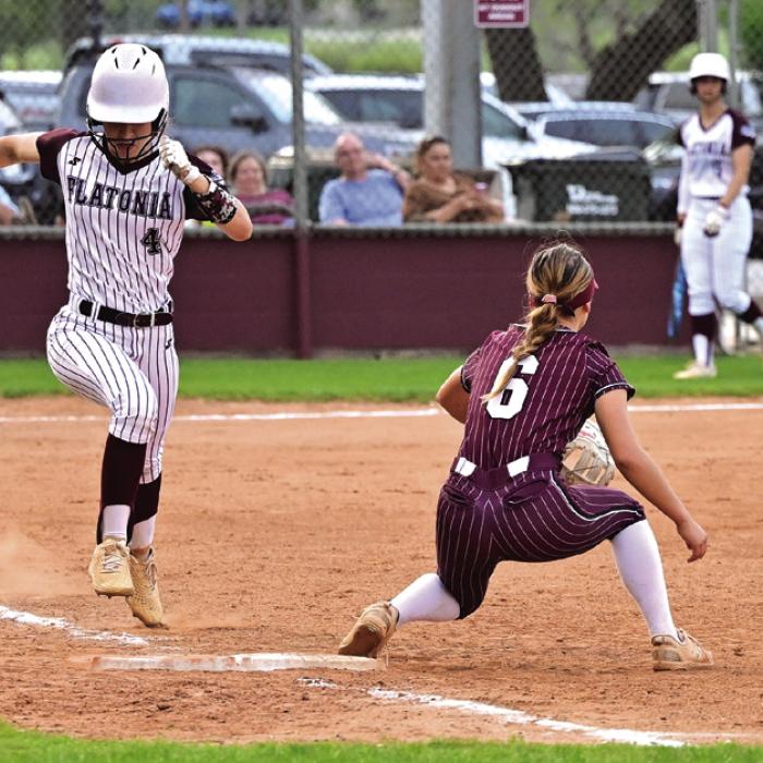 Emma Kosler beats out the throw from third in final home game of the season Friday night against Ganado. Photo by Stephanie Steinhauser