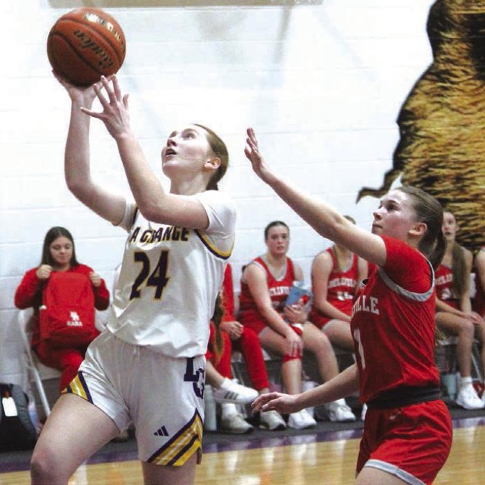 La Grange’s Ella Nygren drives to the basket for two points Tuesday. Photo by Jeff Wick