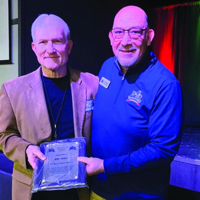 Bill Miller, left, with Eric Forestier, Executive Director of the San Antonio Area Baseball Coaches Association, Hall of Honor Award.