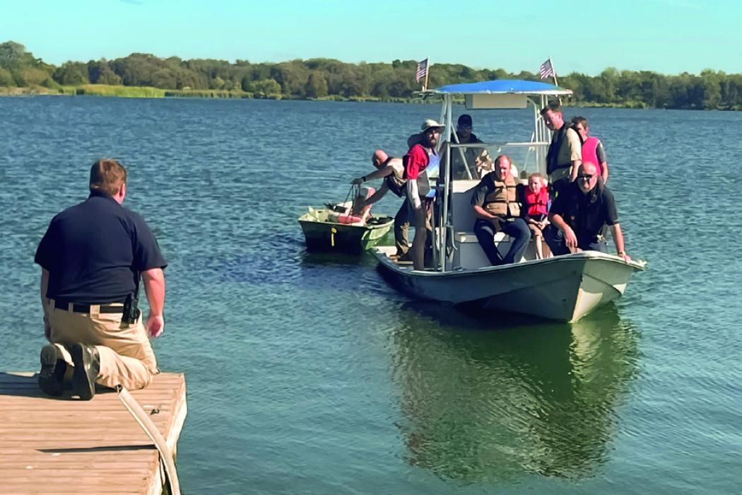 Four Saved After Their Boat Flips at Lake Fayette