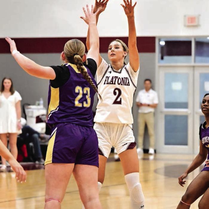 Summer Sodek puts up a 3-pointer against the Shiner Lady Comanches on Friday. The Flatonia Lady Bulldogs defeated Shiner 67-35. Photo by Stephanie Steinhauser