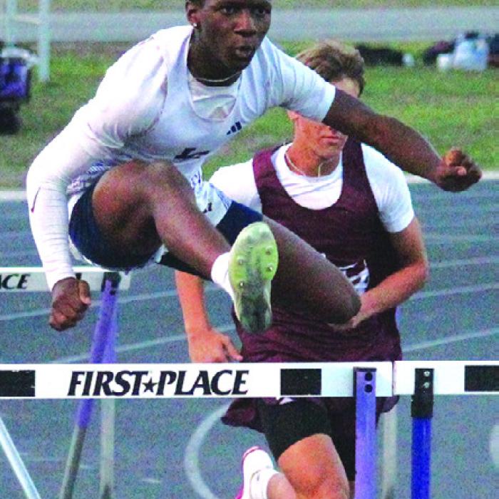La Grange’s Howard “Skip” Holmes placed 6th in the 110 Meter Hurdles. Photos by Jeff Wick