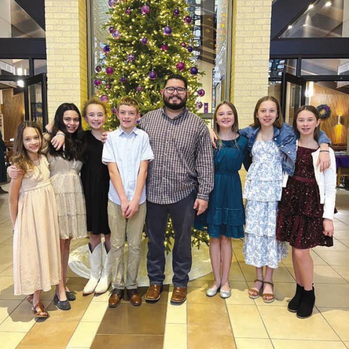 Sixth Grade (L-R): Sophie Janda, Ellery Bradford, Emmy Neal, Ricky Shelander, Mr. Daniel Hernandez (Sacred Music Director and School Music Teacher), Helen Streiff, Hallie Gross, Krislee Kallus. Not pictured: Chezni Berdoll, Marley Vasek, and Adalyn Emmel.