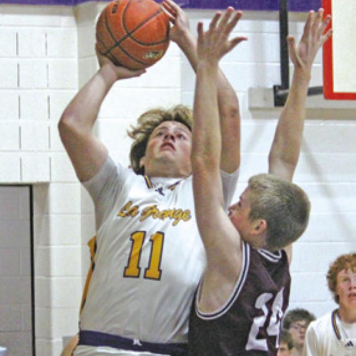 Christian Biles goes to the hoop in Tuesday’s win. Photo by Jeff Wick