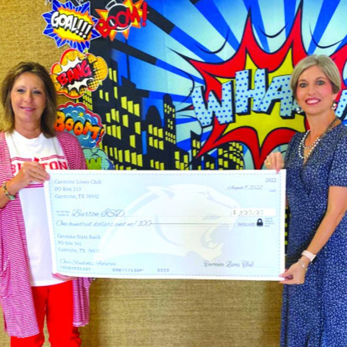 Carmine Lions Club recently made a donation to the Burton ISD for school supplies. Lion Jamie Odom, right, presented the donation to Dr. Edna Kennedy, Superintendent of Burton ISD.