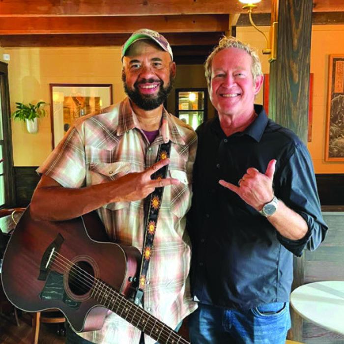 Church musician Joey McGee, left, and Father Bill Miller, right.