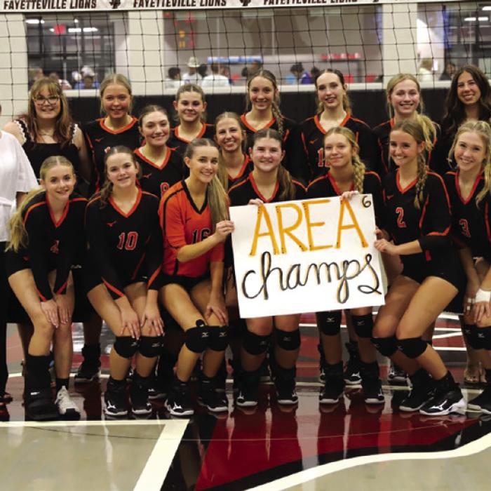 The Schulenburg volleyball team poses after their second round playoff victory Monday over Snook in Fayetteville. Photo by Audrey Kristynik