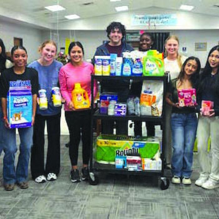 La Grange Leo Club Members Donate to Animal Shelter