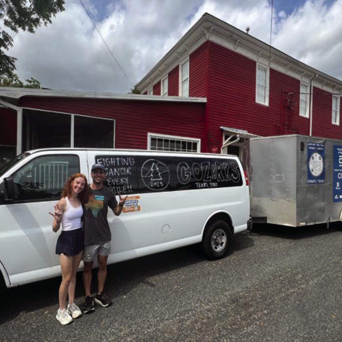 The support trailer holds all the team’s gear and bikes and is a billboard for their mission. Riders Molly O’Brien and Thomas Grannen were on support duty when the team arrived in Fayetteville.
