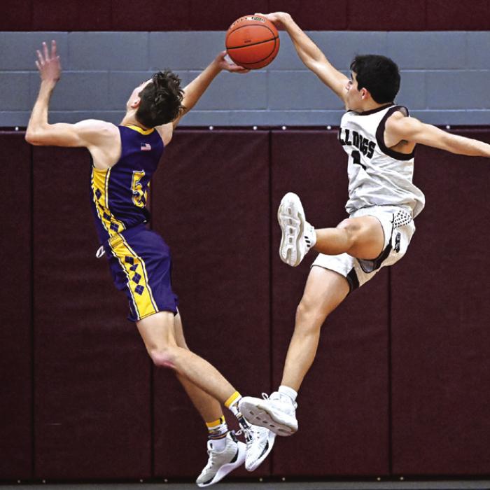 Caysen Perez denies Weimar a two point shot Friday night in Flatonia. Photo by Stephanie Steinhauser