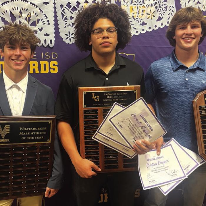 Left to right: Cordale Knapik won the Whataburger Male Athlete of the Year Award, Devonte McKenzie won the Heath Schielack Male Fighting Heart Award, and Clayton Cooper won the Charles Koether/La Grange Optimist Club’s Male Athlete of the Year Award.