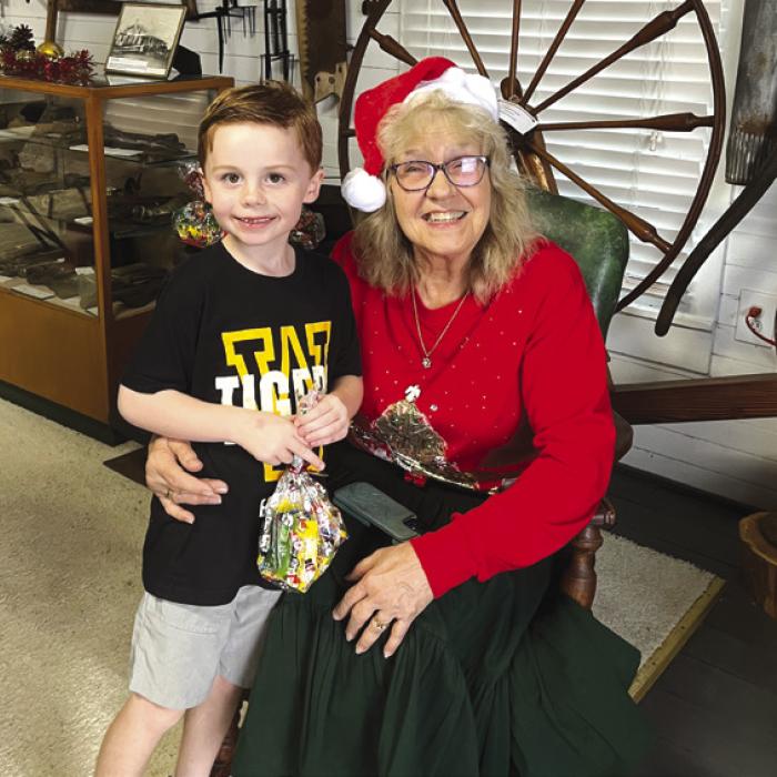 Mrs. Claus and Kasen Miori at Christmas in Muldoon.