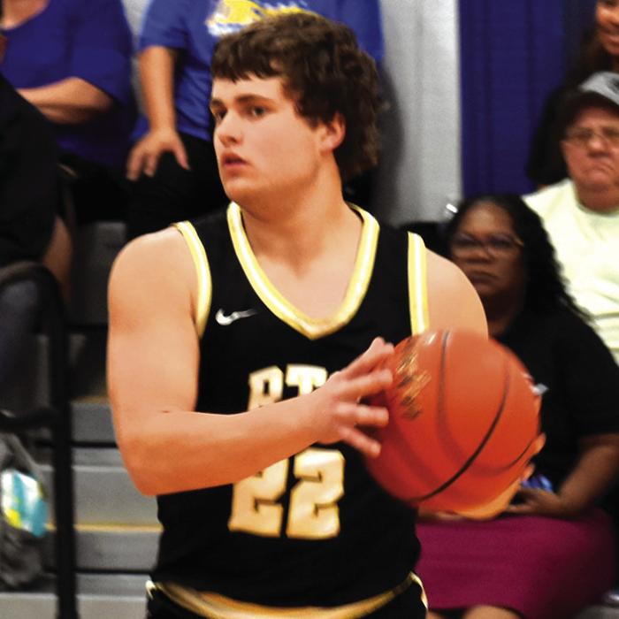 RTC’s Cash Robertson looks to make a pass in a recent game. Photo by Paul Kipp